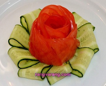 Garnish with cucumber and tomato salad